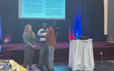 Freddy Makengo, Magloire Kambale, and Maisie Ettinger, BonDiv researchers, presenting the fieldwork at the Ikelemba site, in collaboration with GACEBB